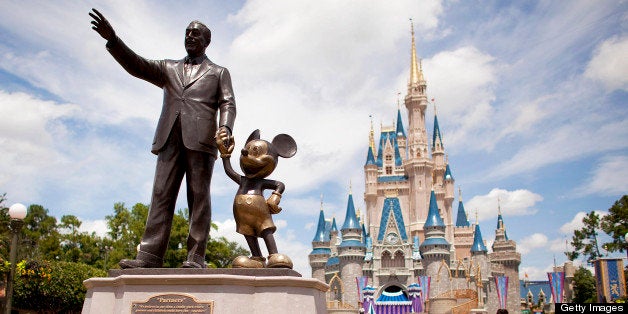 UNITED STATES - AUGUST 31: 'Partners,' a statue of Walt Disney and Mickey Mouse, sits in front of Cinderalla Castle at Magic Kingdom, part of the Walt Disney World theme park and resort in Lake Buena Vista, Florida, U.S., on Monday, Aug. 31, 2009. Walt Disney Co. said it agreed to buy Marvel Entertainment Inc. for about $4 billion in a stock and cash transaction, gaining comic book characters including Iron Man, Spider-Man and Captain America. (Photo by Matt Stroshane/Bloomberg via Getty Images)