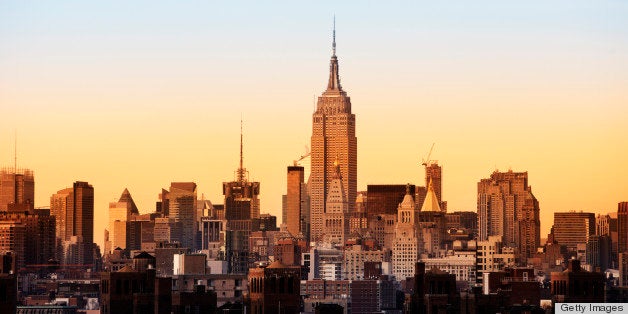 Skyline of New York with Empire State Building- see from Brooklyn bridge