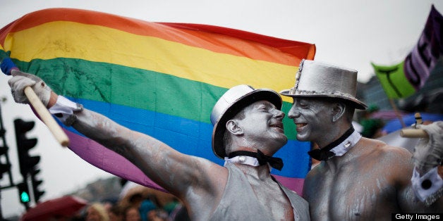 Men kiss during the HBTQ festival 'Stockholm Pride' parade on August 6, 2011 in central Stockholm. AFP PHOTO / JONATHAN NACKSTRAND (Photo credit should read JONATHAN NACKSTRAND/AFP/Getty Images)