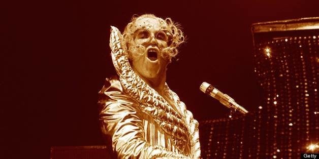 UNITED STATES - OCTOBER 01: USA Photo of Elton JOHN, Elton John performing on stage , shiny costume (Photo by Robert Knigh