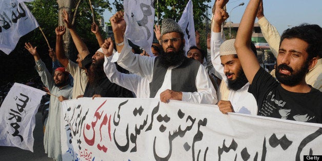 Islamic students of Islami Jamiat Tulba (IJT), the student wing of Jamaat-e-Islami (JI), Pakistan's largest Islamic party, demonstrate as they denounce a gay rights event hosted last month by the United States embassy, in Lahore on July 4, 2011. Demosntrators called the meeting 'an assault on Pakistan's Islamic culture' while similar demonstrations were held in the capital Islamabad. AFP PHOTO/ARIF ALI (Photo credit should read Arif Ali/AFP/Getty Images)