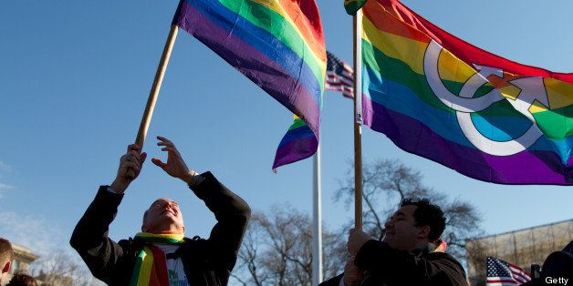 [UNVERIFIED CONTENT] Supporters of gay marriage hold rainbow flags during the DOMA and Prop 8 hearing at the Supreme Court in March 2013.