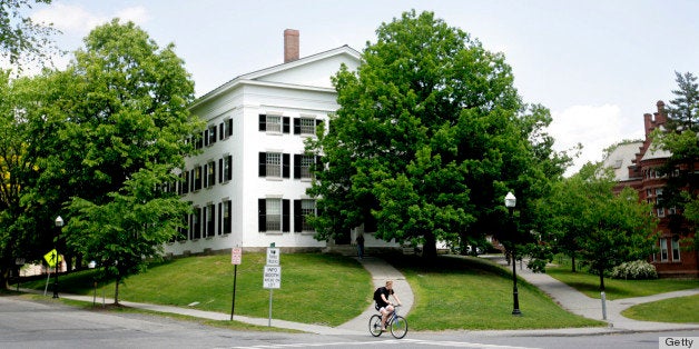 UNITED STATES - JUNE 02: A man rides a bike on the campus of Dartmouth College, the smallest school in the Ivy League, in Hanover, New Hampshire, U.S., on Tuesday, June 2, 2009. Dartmouth, whose endowment was valued at $3.7 billion as of June 30, likely lost about 23 percent from that point through the end of March, Moody's Investors Service said on May 27. (Photo by Cheryl Senter/Bloomberg via Getty Images)