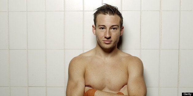 BRISBANE, AUSTRALIA - MAY 29: Diver Matthew Mitcham poses after the Australian 2012 Olympic Games team announcement at Chandler Aquatic Centre on May 29, 2012 in Brisbane, Australia. (Photo by Chris Hyde/Getty Images)