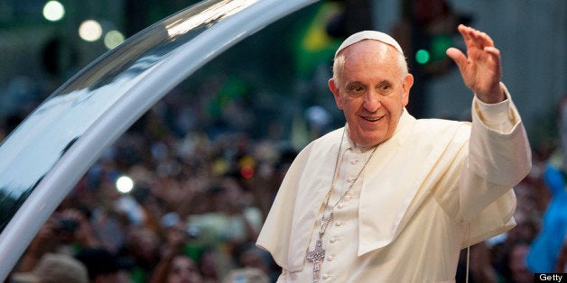 RIO DE JANEIRO, BRAZIL - JULY 22: Pope Francis waves to the crowd after departing the Metropolitan Cathedral in the Popemobile after arriving in Rio on July 22, 2013 in Rio de Janeiro, Brazil. More than 1.5 million pilgrims are expected to join Pope Francis for his visit to the Catholic Church's World Youth Day celebrations. Pope Francis is scheduled to visit Brazil from July 22 to 28. (Photo by Buda Mendes/Getty Images)