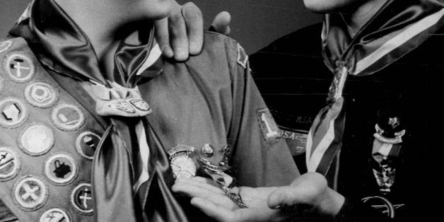 DEC 5 1959, DEC 6 1959; Win Top Rank in Scouting; Jeff Bier (left) of 10705 W. 35th Pl. and Rick Lopez, 10765 W. 35th Pl., neighbors in Wheat Ridge, share the pride of achievement as they display their badges as Eagle Scouts, highest rank in Scouting. The boys, who are members of Boy Scout Troop 120 sponsored by the Fruitdale P-TA, received the awards at a Denver regional court of honor in which 85 boys won honors. Troop 120 was the only troop in the Denver area which had two members receiving the award. Scoutmaster for the troop is Jeff's dad. Robert Bier.; (Photo By Cloyd Teter/The Denver Post via Getty Images)