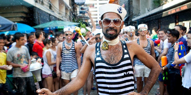 [UNVERIFIED CONTENT] Gay men dressed up as Sailors Marching through soi 4 in Silom Bangkok. Songkran, 2012