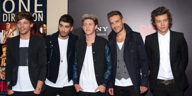 NEW YORK, NY - AUGUST 26: (L-R) Louis Tomlinson, Zayn Malik, Niall Horan, Liam Payne, and Harry Styles of One Direction attend the New York premiere of 'One Direction: This Is Us' at the Ziegfeld Theater on August 26, 2013 in New York City. (Photo by D Dipasupil/FilmMagic)