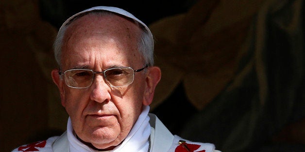 Pope Francis celebrates the Assumption Day mass in the Castelgandolfo's central square on August 15, 2013. AFP PHOTO / POOL/ ALESSANDRO BIANCHI (Photo credit should read ALESSANDRO BIANCHI/AFP/Getty Images)