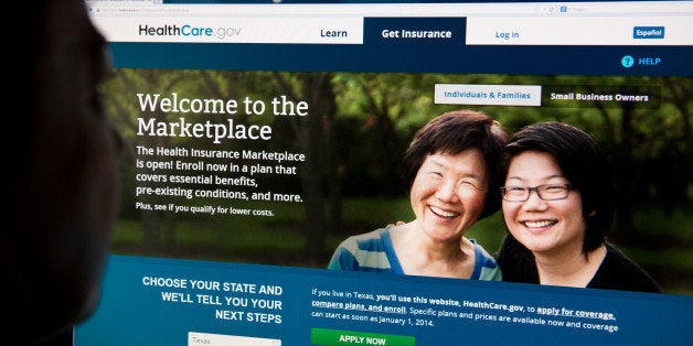 A woman looks at the HealthCare.gov insurance exchange internet site October 1, 2013 in Washington, DC. US President Barack Obama's Affordable Care Act, or Obamacare as it is commonly called, passed in March 2010, went into effect Tuesday at 8am EST. Heavy Internet traffic and system problems plagued the launch of the new health insurance exchanges Tuesday morning. Consumers attempting to log on were met with an error message early Tuesday due to an overload of Internet traffic. AFP PHOTO / Karen BLEIER (Photo credit should read KAREN BLEIER/AFP/Getty Images)