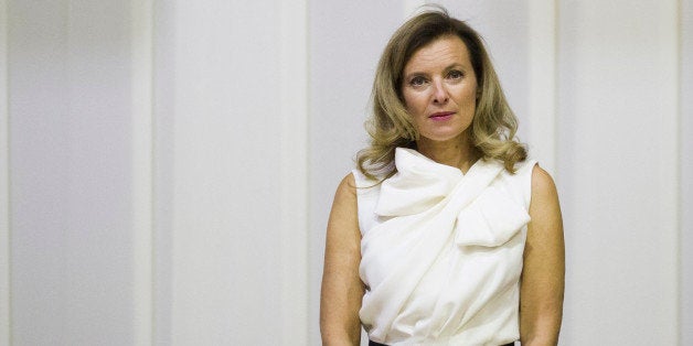 Valerie Trierweiler, partner of French President stands as she listens national anthems during a state dinner with South Afri