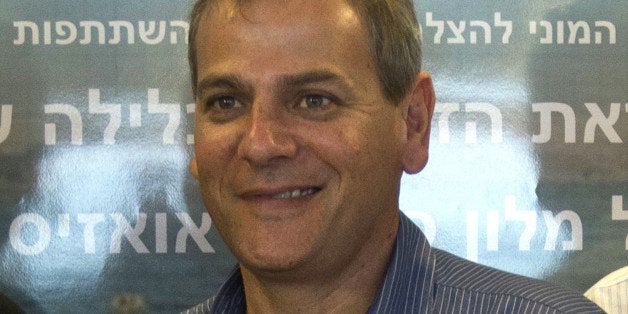 US art photographer Spencer Tunick (L) poses with Israeli member of Kenesset (parliament) Nitzan Horowitz after receiving the