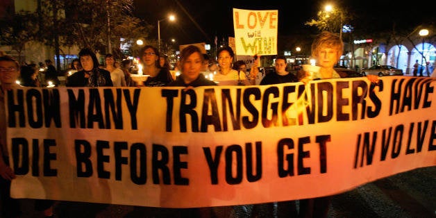 West Hollywood, UNITED STATES: Members of the Gay, Lesbian and Transgender community demonstrate during the 'Transgender Day of Remembrance' in West Hollywood, CA, 20 November 2006. The day was set aside to remember those who were killed due to anti-transgender hate or prejudice. The demonstration finshed at the Mathew Sheppard Square, a place that was named after the young gay man was killed because of his sexual orientation in Laramie, Wyoming in 1998. AFP PHOTO / HECTOR MATA (Photo credit should read HECTOR MATA/AFP/Getty Images)