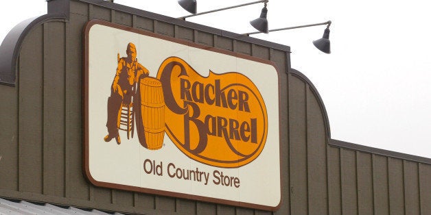 403848 08: A Cracker Barrel Old Country Store sign is visible atop one of its restaurant stores April 12, 2002 in Naperville,