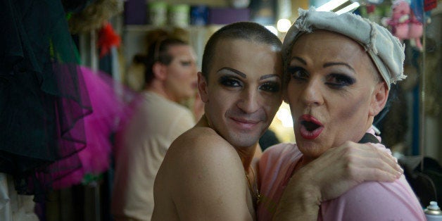 TO GO WITH AFP STORY BY MARIA ANTONOVAPerformers pose for a photo backstage before their show in a gay club in the Russian Black Sea resort of Sochi on September 28, 2013. While Western activists call for an outright boycott of the Winter Olympics in Sochi over a homophobic new law, the city's discreet gay community wants athletes to compete in the Games -- and wear rainbow shirts. AFP PHOTO / MIKHAIL MORDASOV (Photo credit should read MIKHAIL MORDASOV/AFP/Getty Images)