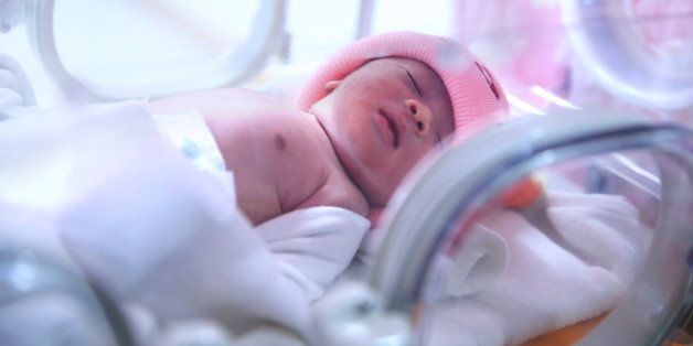 newborn baby in hospital post...