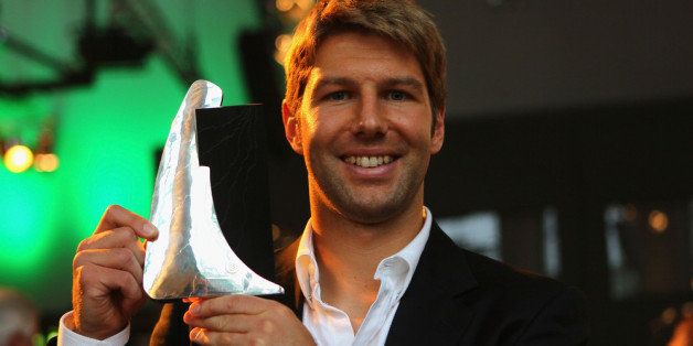 DUESSELDORF, GERMANY - OCTOBER 11: Thomas Hitzlsperger, presents the trophy of the honorary prize of the Julius Hirsch Award during the Julius Hirsch Award 2011 at the Event Hall on October 11, 2011 in Duesseldorf, Germany. (Photo by Christof Koepsel/Bongarts/Getty Images)