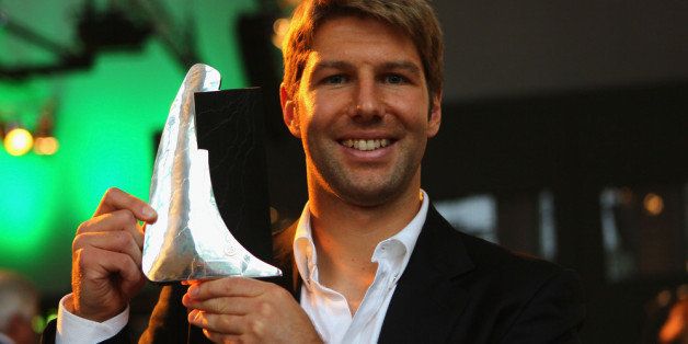 DUESSELDORF, GERMANY - OCTOBER 11: Thomas Hitzlsperger, presents the trophy of the honorary prize of the Julius Hirsch Award during the Julius Hirsch Award 2011 at the Event Hall on October 11, 2011 in Duesseldorf, Germany. (Photo by Christof Koepsel/Bongarts/Getty Images)