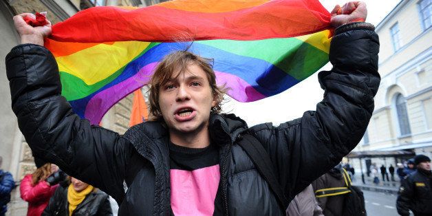A gay rights activists takes part in a joint opposition rally called 'March against Hatred' in the Russia's second city of St. Petersburg, on November 2, 2013. AFP PHOTO / OLGA MALTSEVA (Photo credit should read OLGA MALTSEVA/AFP/Getty Images)