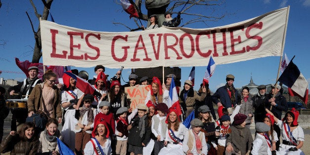 PARIS, FRANCE - FEBRUARY 02: Anti-gay demonstrators take part in the protest march 'La Manif Pour Tous' (Protest For Everyone) on February 2, 2014 in Paris, France. Parisian Police expected over 100,000 protesters to line the streets of Paris today to show their support for traditional family values and demonstrate against France's legalisation of same-sex marriage and other planned policies that would allow same sex couples to adopt or have children. (Photo by Kristy Sparow/Getty Images)