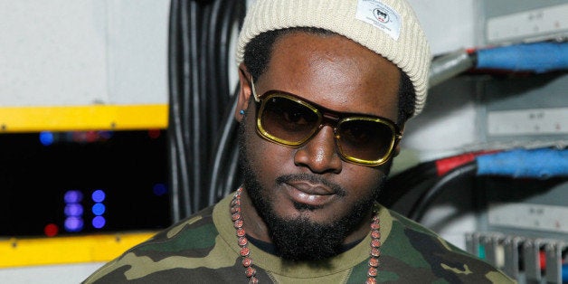 ATLANTA, GA - DECEMBER 11: T-Pain poses backstage at Power 96.1's Jingle Ball 2013 at Philips Arena on December 11, 2013 in Atlanta, Georgia. (Photo by Ben Rose/Getty Images for Clear Channel)