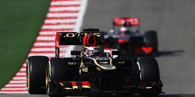 AUSTIN, TX - NOVEMBER 17: Heikki Kovalainen of Finland and Lotus drives during the United States Formula One Grand Prix at Circuit of The Americas on November 17, 2013 in Austin, United States. (Photo by Mark Thompson/Getty Images)
