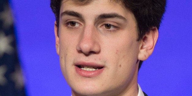 WASHINGTON, DC - NOVEMBER 20: Jack Schlossberg, the grandson of President John F. Kennedy, introduces President Barack Obama during a dinner in honor of the Medal of Freedom awardees at the Smithsonian National Museum of American History on November 20, 2013 in Washington, DC. The Presidential Medal of Freedom is the nation's highest civilian honor, presented to individuals who have made meritorious contributions to the security or national interests of the United States, to world peace, or to cultural or other significant public or private endeavors. (Photo by Kevin Dietsch-Pool/Getty Images)