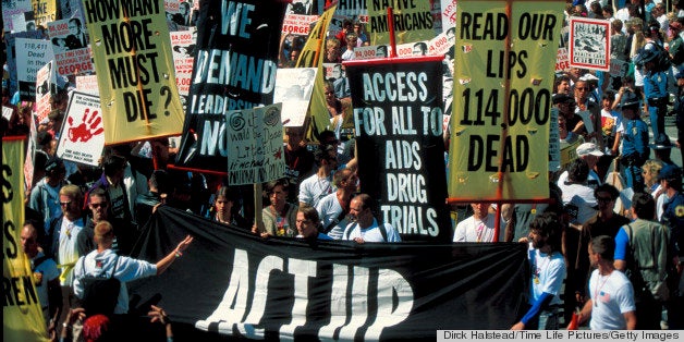 (Some 1500) gay advocates protesting Pres. Bush's AIDS policy in ACT UP demo, replete w. signs, in Bush vacation town, Kennebunkport, ME. (Photo by Dirck Halstead//Time Life Pictures/Getty Images)