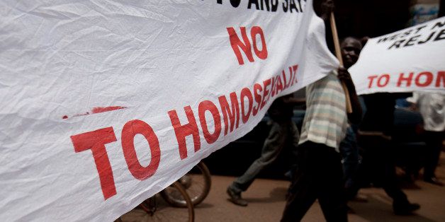 Photo taken on February 14, 2010 shows Ugandans taking part in an anti-gay demonstration at Jinja, Kampala. A Ugandan pastor seeking to bolster Uganda's anti-gay laws which already make homosexuality punishable by life imprisonment screened gay porn in a packed Kampala church on February 17, 2010 in a bid to drum up support that was attended by around 300 supporters after plans for a 'million-man march' were thwarted by police. AFP PHOTO/TREVOR SNAPP (Photo credit should read Trevor Snapp/AFP/Getty Images)