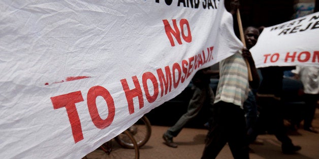 Photo taken on February 14, 2010 shows Ugandans taking part in an anti-gay demonstration at Jinja, Kampala. A Ugandan pastor