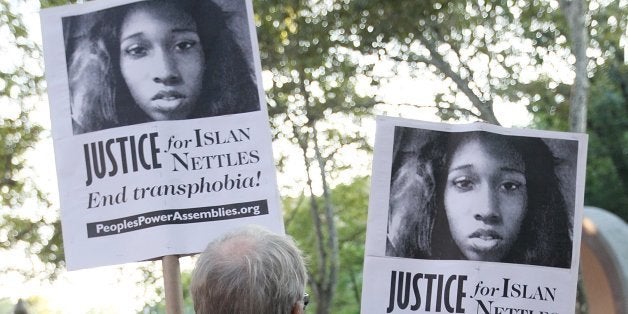 NEW YORK, NY - AUGUST 27: People embrace before a vigil for slain transgender woman Islan Nettles at Jackie Robinson Park in