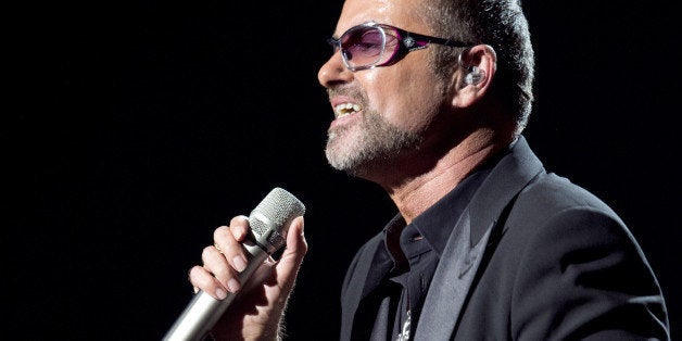 British singer George Michael performs on stage during a charity gala for the benefit of Sidaction, at the Opera Garnier in Paris, on September 9, 2012. Sidaction is a charity event which aims to collect money for the struggle against AIDS virus. AFP PHOTO MIGUEL MEDINA (Photo credit should read MIGUEL MEDINA/AFP/GettyImages)