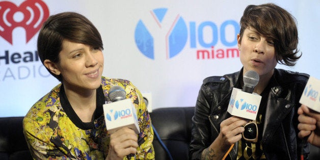 SUNRISE, FL - DECEMBER 20: Sara Quin (L) and Tegan Quin of Tegan and Sara attend Y100s Jingle Ball 2013 Presented by Jam Au