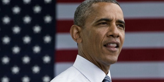 US President Barack Obama speaks on the economy at the Lake Harriet Band Shell in Minneapolis, Minnesota on June 27, 2014. AFP PHOTO/Mandel NGAN (Photo credit should read MANDEL NGAN/AFP/Getty Images)