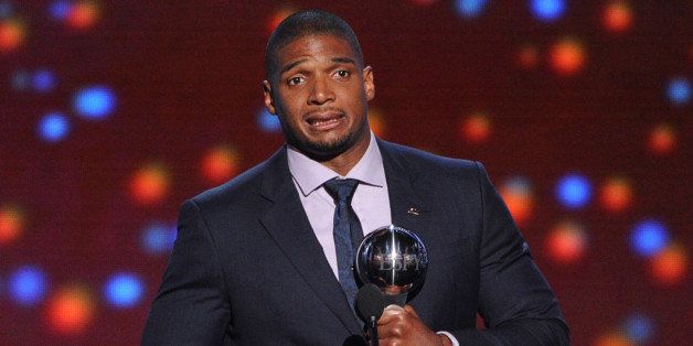 LOS ANGELES, CA - JULY 16: NFL player Michael Sam accepts the Arthur Ashe Courage Award onstage during the 2014 ESPYS at Nokia Theatre L.A. Live on July 16, 2014 in Los Angeles, California. (Photo by Kevin Winter/Getty Images)