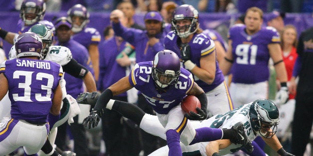 MINNEAPOLIS, MN - DECEMBER 15: Shaun Prater #27 of the Minnesota Vikings intercepts the pass intended for Jeremy Maclin #18 of the Philadelphia Eagles on December 15, 2013 at Mall of America Field at the Hubert H. Humphrey Metrodome in Minneapolis, Minnesota. (Photo by Adam Bettcher/Getty Images)