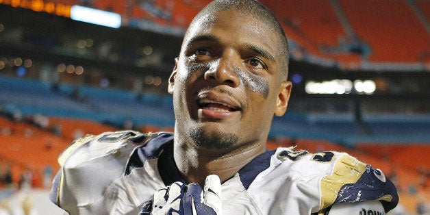MIAMI GARDENS, FL - AUGUST 28: Michael Sam #96 of the St. Louis Rams exits the field after the preseason game against the Miami Dolphins on August 28, 2014 at Sun Life Stadium in Miami Gardens, Florida. The Dolphins defeated the Rams 14-13. (Photo by Joel Auerbach/Getty Images)