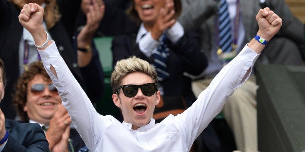 LONDON, ENGLAND - JUNE 26: Niall Horan attends the Lukas Rosol v Rafael Nadal match on centre court during day four of the Wimbledon Championships at Wimbledon on June 26, 2014 in London, England. (Photo by Karwai Tang/WireImage)