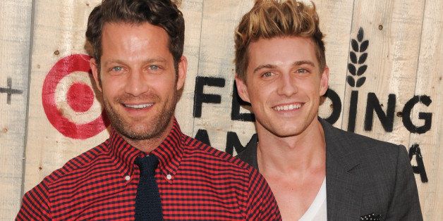 Nate Berkus, left, and boyfriend Jeremiah Brent attend the FEED USA Target launch event on Wednesday, June 19, 2013 in New York. (Photo by Evan Agostini/Invision/AP)