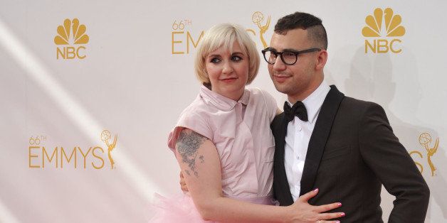 Lena Dunham, left, and Jack Antonoff arrive at the 66th Annual Primetime Emmy Awards at the Nokia Theatre L.A. Live on Monday, Aug. 25, 2014, in Los Angeles. (Photo by Richard Shotwell/Invision/AP)