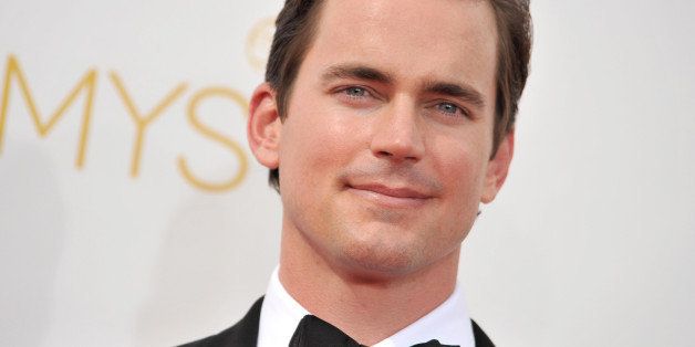 Matt Bomer arrives at the 66th Annual Primetime Emmy Awards at the Nokia Theatre L.A. Live on Monday, Aug. 25, 2014, in Los Angeles. (Photo by Richard Shotwell/Invision/AP)