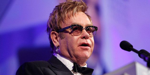WASHINGTON, DC - OCTOBER 25: Sir Elton John is honored with HRC's National Equality Award at the 18th Annual HRC National Dinner at The Walter E. Washington Convention Center on October 25, 2014 in Washington, DC. (Photo by Paul Morigi/Getty Images)