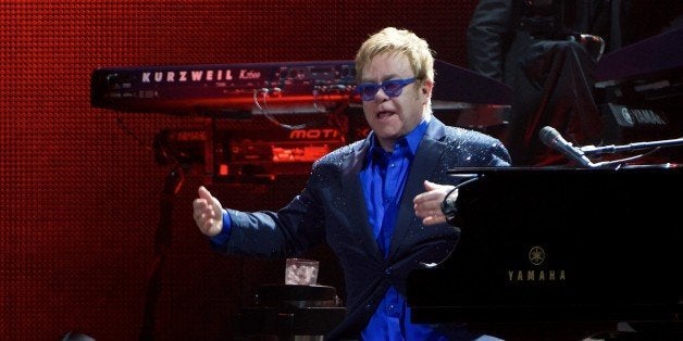 MADRID, SPAIN - NOVEMBER 01: Elton John performs on stage at the Palacio de los Deportes stadium on November 1, 2014 in Madrid, Spain. (Photo by Carlos Alvarez/Redferns via Getty Images)