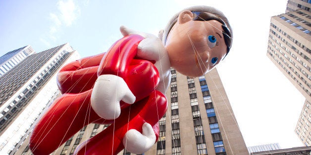 The Elf on the Shelf balloon floats in the Macy's Thanksgiving Day Parade in New York in New York, Thursday, Nov. 22, 2012. (AP Photo/Charles Sykes)