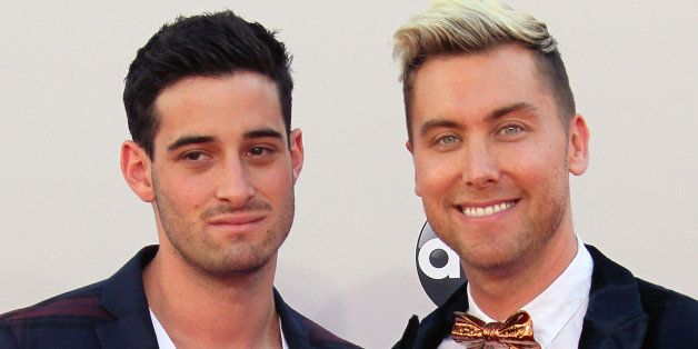 LOS ANGELES, CA - NOVEMBER 23: Singer/actor Lance Bass (R) and fiance Michael Turchin attend the 42nd Annual American Music Awards at the Nokia Theatre L.A. Live on November 23, 2014 in Los Angeles, California. (Photo by David Livingston/Getty Images)