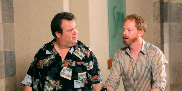 In this publicity image released by ABC, Eric Stonestreet, left and Jesse Tyler Ferguson are shown in a scene from "Modern Family." Jay could not be more excited to do nothing but indulge and relax in this tropical paradise, but then an unexpected reality check dampens his plans. Meanwhile, Phil is determined to make this trip romantic for Claire, Mitchell and Cameron have opposing views on whether to sightsee or not to sightsee, and the kids get into a little bit of mischief when left to their own devices, on "Modern Family," WEDNESDAY, MAY 12 (9:00-9:30 p.m., ET), on the ABC Television Network. (AP Photo/ABC/MARIO PEREZ)