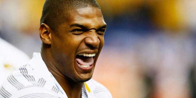 ATLANTA, GA - DECEMBER 06: NFL player Michael Sam attends the SEC Championship game between the Alabama Crimson Tide and the Missouri Tigers at the Georgia Dome on December 6, 2014 in Atlanta, Georgia. (Photo by Kevin C. Cox/Getty Images)