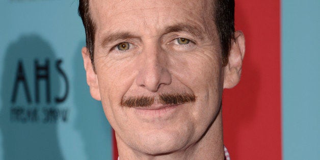 Denis O'Hare arrives at the premiere screening of "American Horror Story: Freak Show" at the TCL Chinese Theatre on Sunday, O