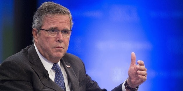 Former Florida Governor Jeb Bush speaks during the Wall Street Journal CEO Council in Washington, DC, December 1, 2014. AFP PHOTO / Jim WATSON (Photo credit should read JIM WATSON/AFP/Getty Images)