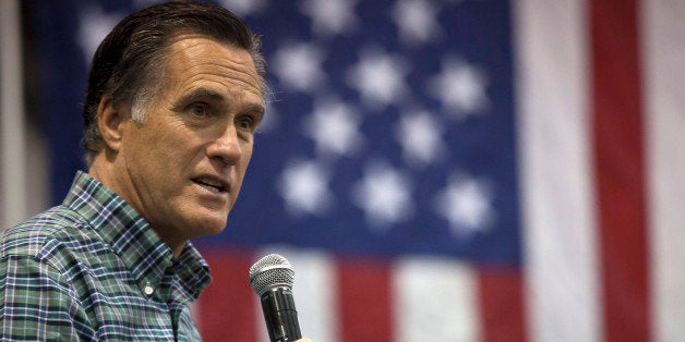 ANCHORAGE, AK - NOVEMBER 03: Former Massachusetts Gov. Mitt Romney addresses the crowd during a rally for Republican Senate candidate Dan Sullivan at a PenAir airplane hangar on November 3, 2014 in Anchorage, Alaska. The U.S. Senate race in Alaska between incumbent Democratic Sen. Mark Begich and Republican candidate Dan Sullivan continues to be closely contested. (Photo by David Ryder/Getty Images)